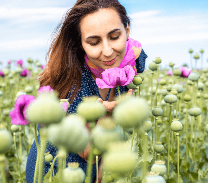 LADY SMELLING FLOWER